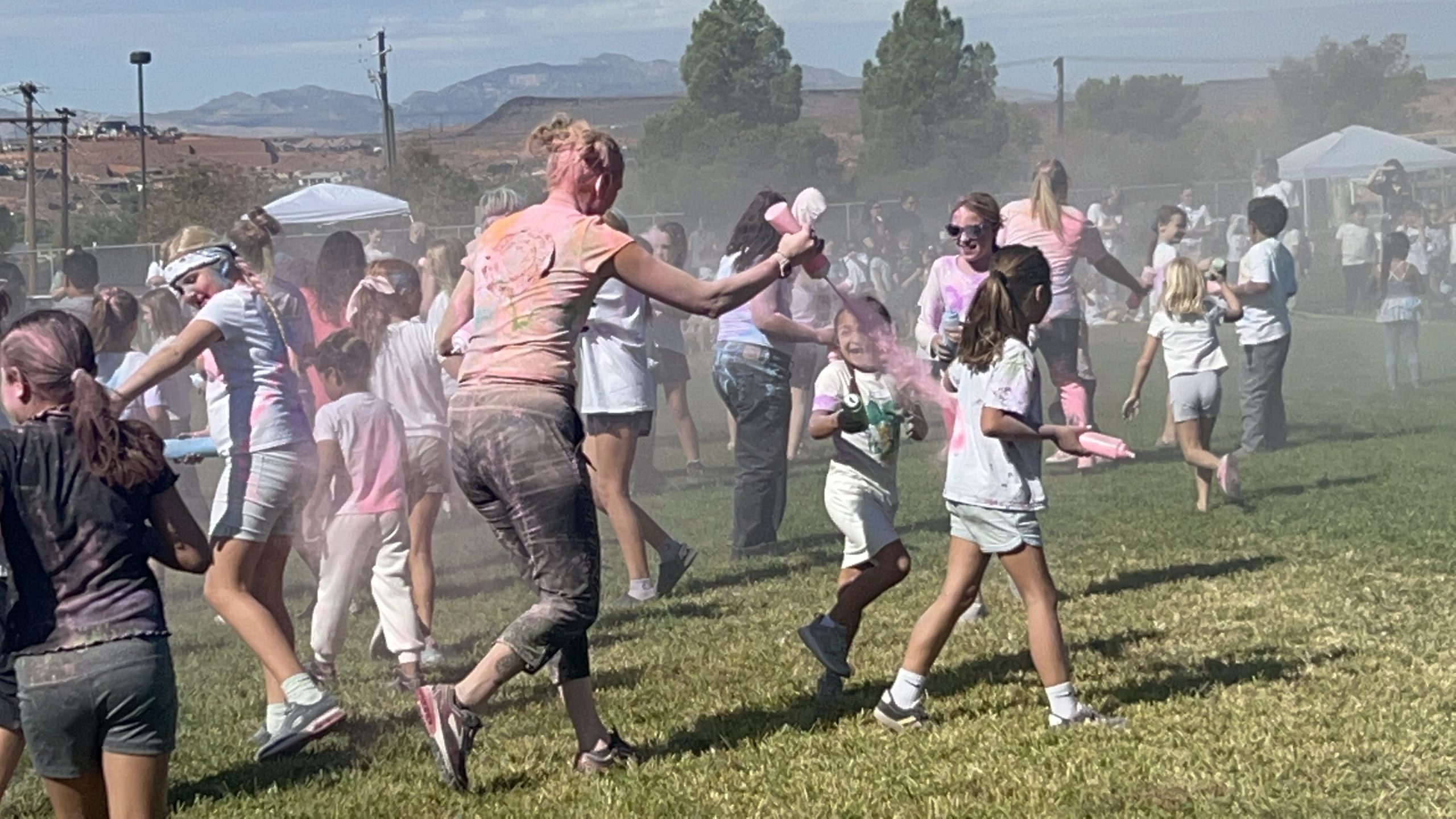 Teachers and students throwing chalk at each other